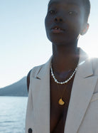 pearl necklace and oyster pendant