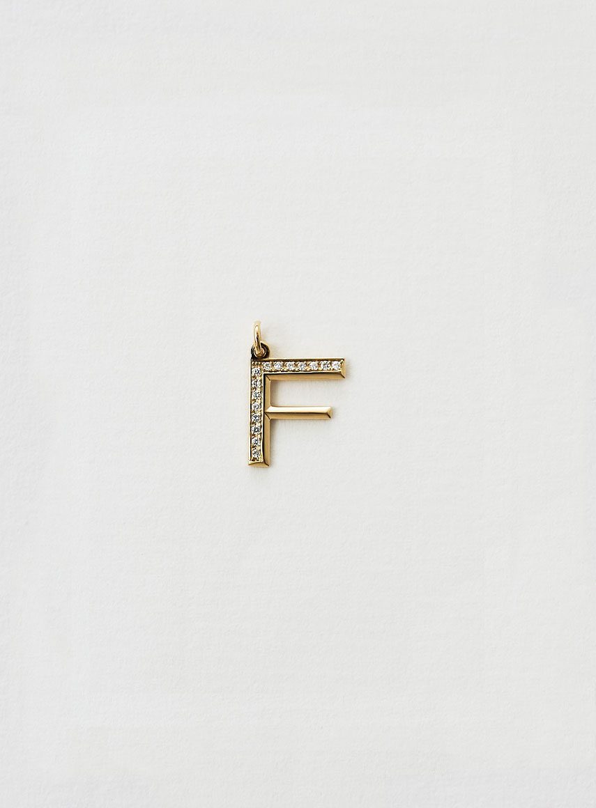 mini diamond letter F yellow gold